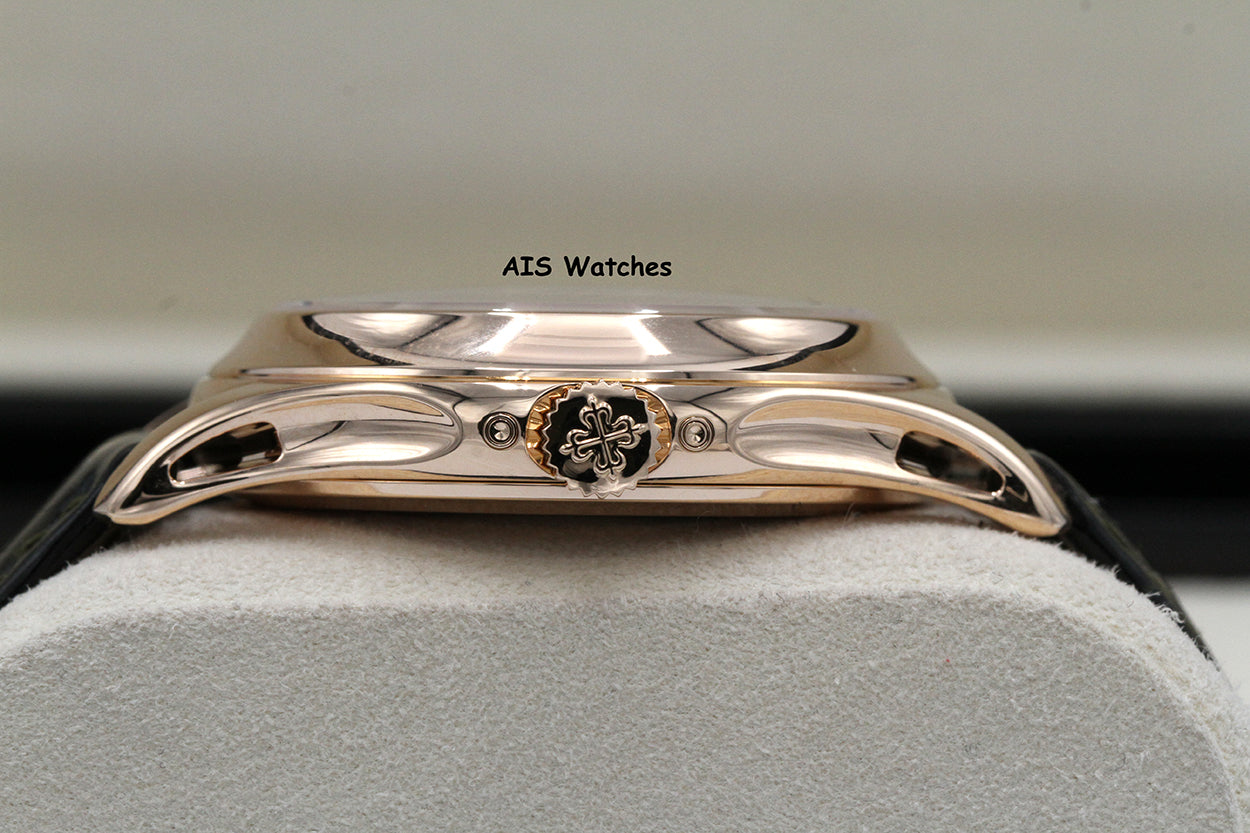 Patek Philippe Annual Calendar 5205R Rose Gold Green Dial Box & Papers