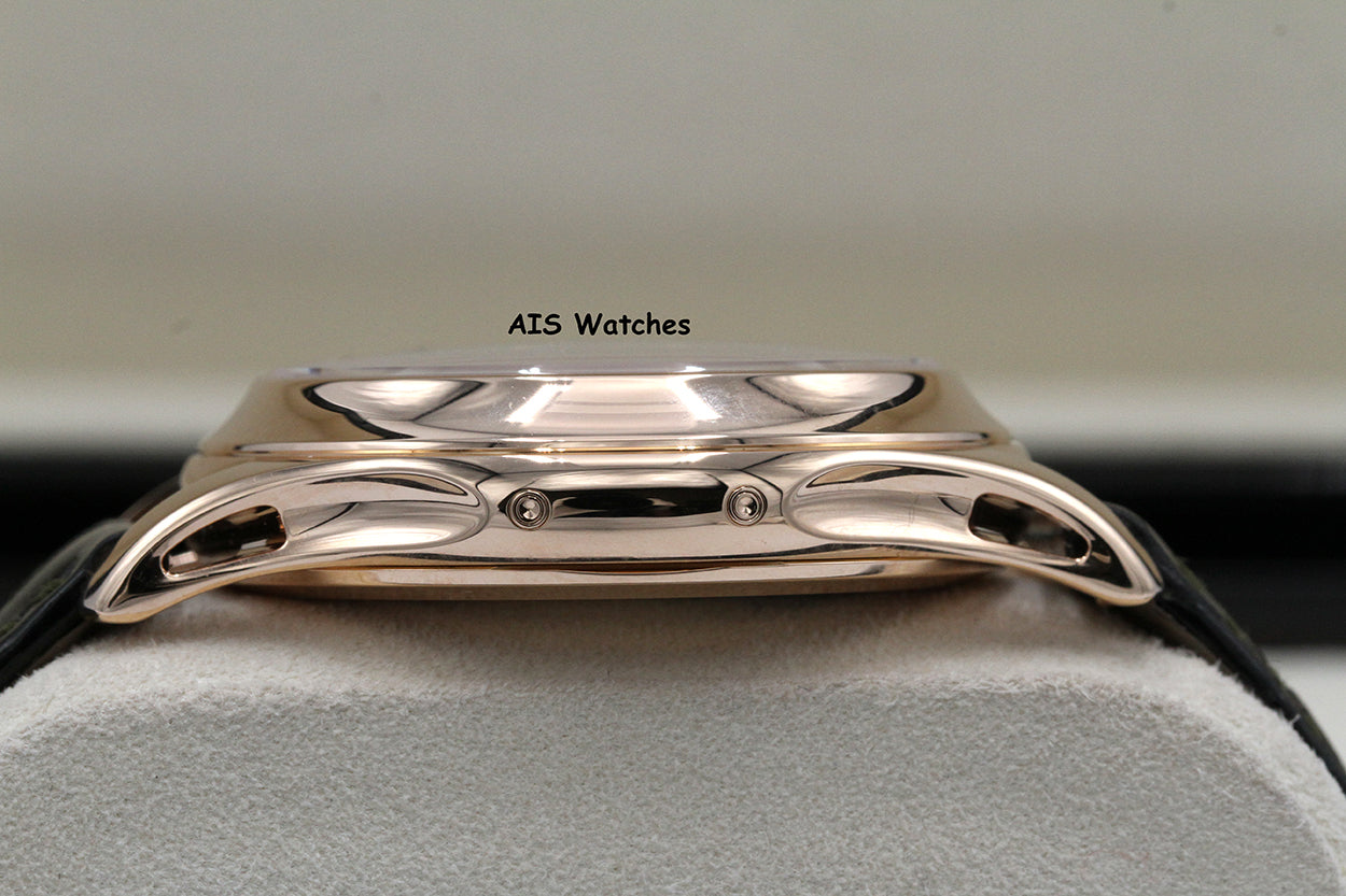 Patek Philippe Annual Calendar 5205R Rose Gold Green Dial Box & Papers