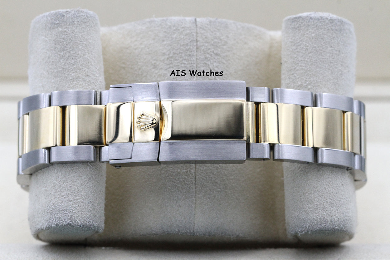 Rolex Daytona 116523 18K YG / SS White Dial F Serial