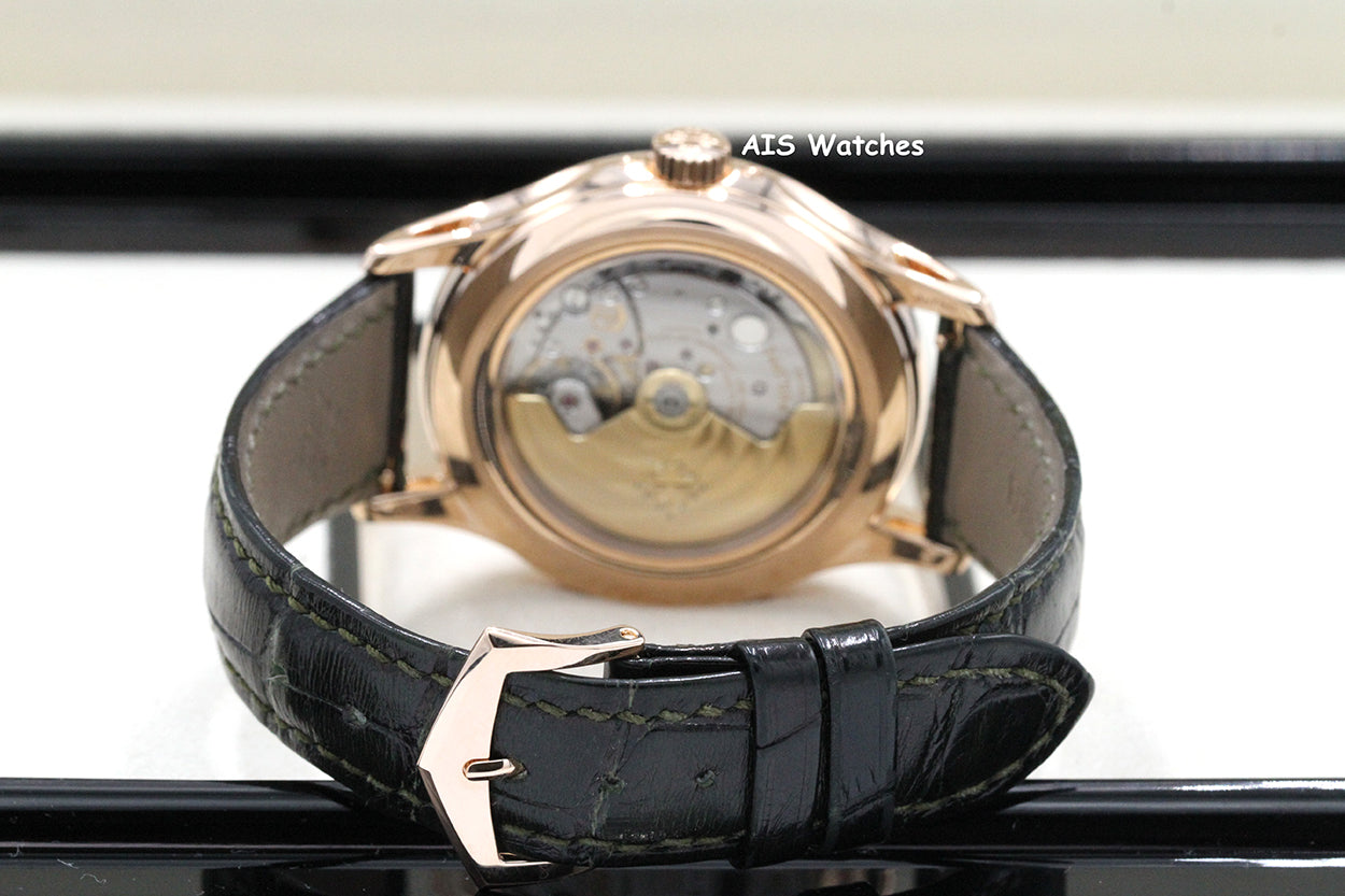 Patek Philippe Annual Calendar 5205R Rose Gold Green Dial Box & Papers