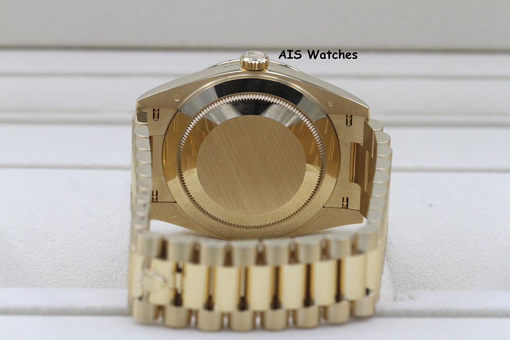 BNIB Rolex 228398TBR DayDate 40 18K YG Champagne Baguette Diamond Dial / Bezel