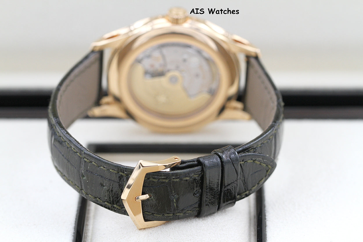 Patek Philippe Annual Calendar 5205R Rose Gold Green Dial Box & Papers