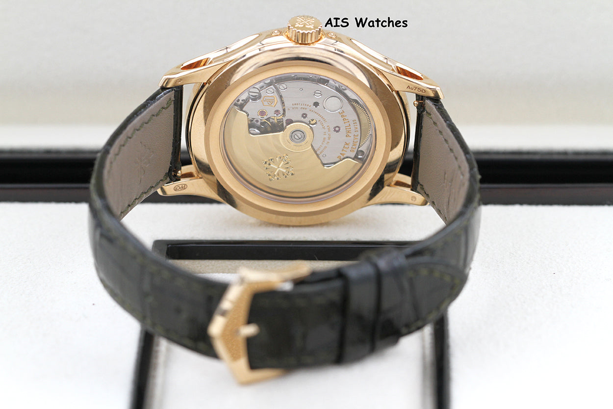 Patek Philippe Annual Calendar 5205R Rose Gold Green Dial Box & Papers