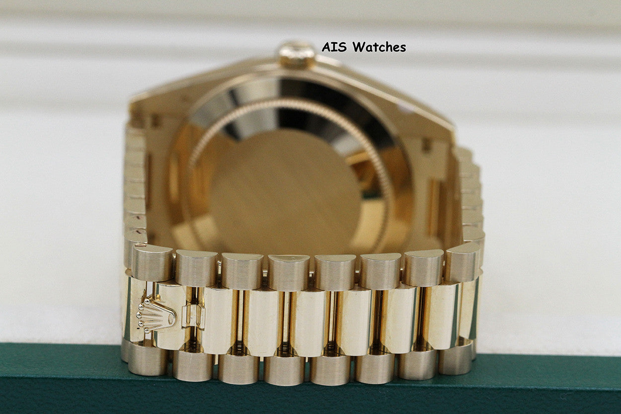 BNIB Rolex 228238 DayDate 40MM DD40 Yellow Gold Green Roman Dial B&P