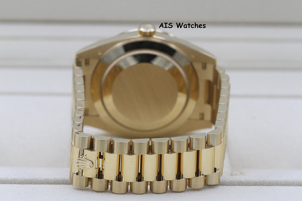 BNIB Rolex 228398TBR DayDate 40 18K YG Champagne Baguette Diamond Dial / Bezel