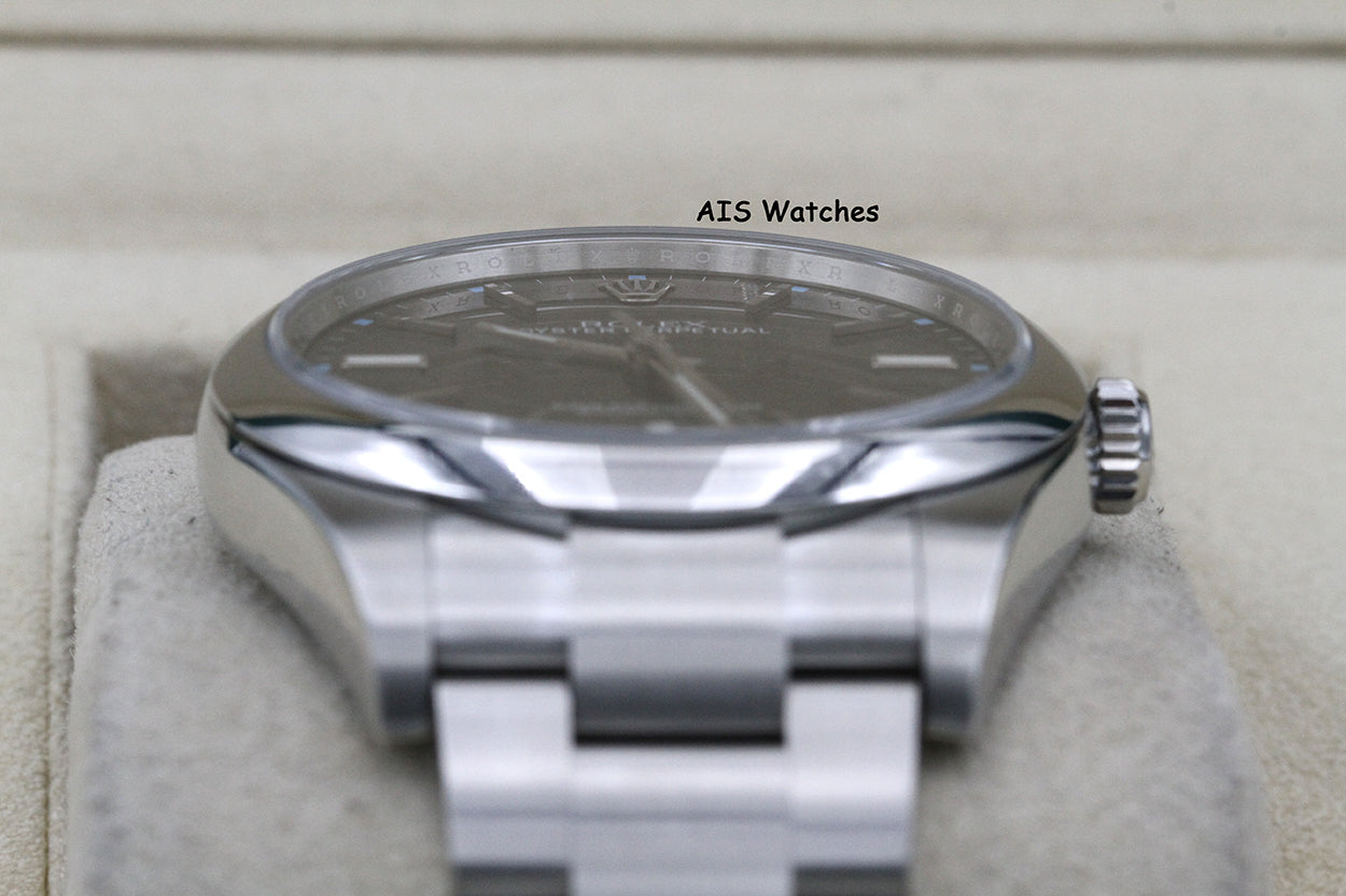 Rolex 114300 Oyster Perpetual 39MM Rhodium Dial 2016 Box & Papers