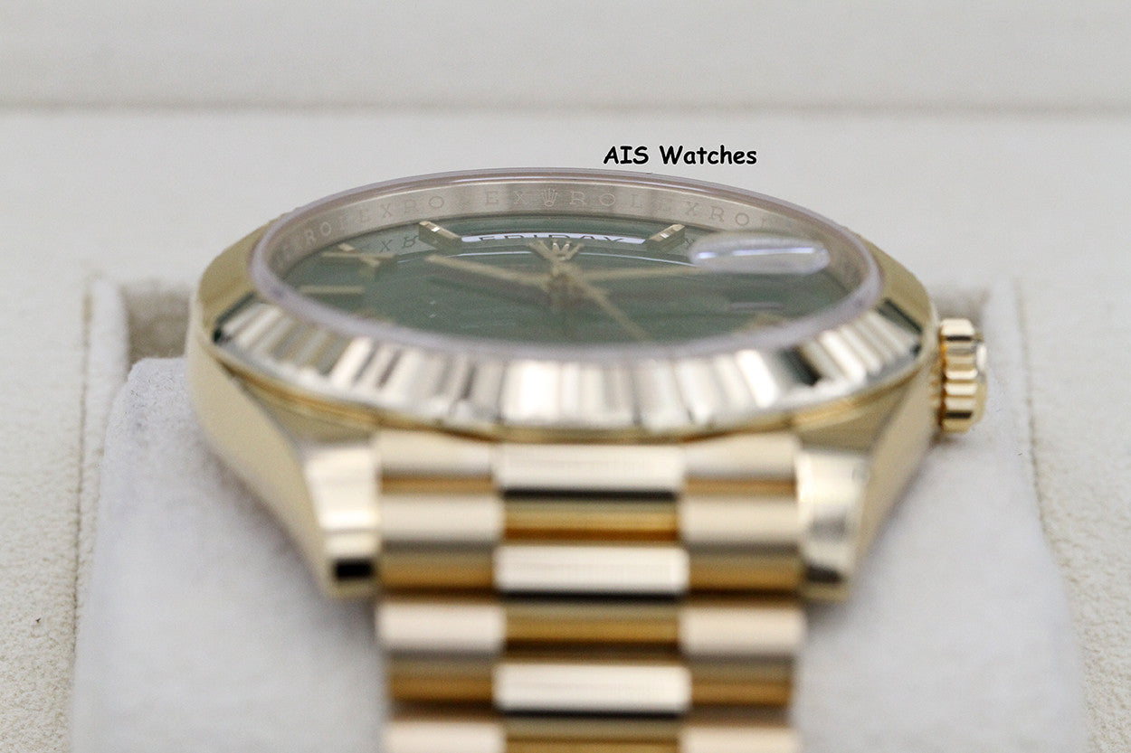 BNIB Rolex 228238 DayDate 40MM DD40 Yellow Gold Green Roman Dial B&P