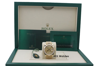 BNIB Rolex 228398TBR DayDate 40 18K YG Champagne Baguette Diamond Dial / Bezel