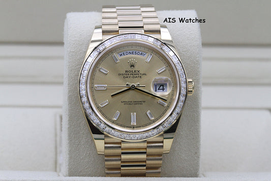 BNIB Rolex 228398TBR DayDate 40 18K YG Champagne Baguette Diamond Dial / Bezel