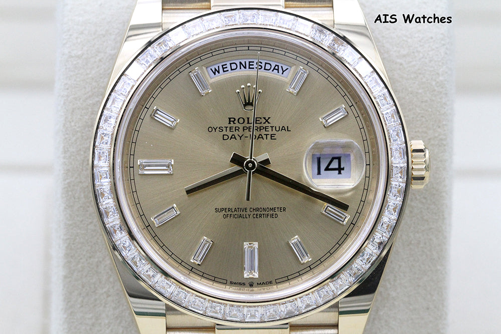 BNIB Rolex 228398TBR DayDate 40 18K YG Champagne Baguette Diamond Dial / Bezel