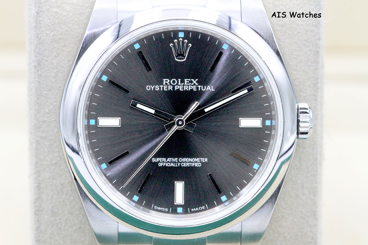Rolex 114300 Oyster Perpetual 39MM Rhodium Dial 2016 Box & Papers