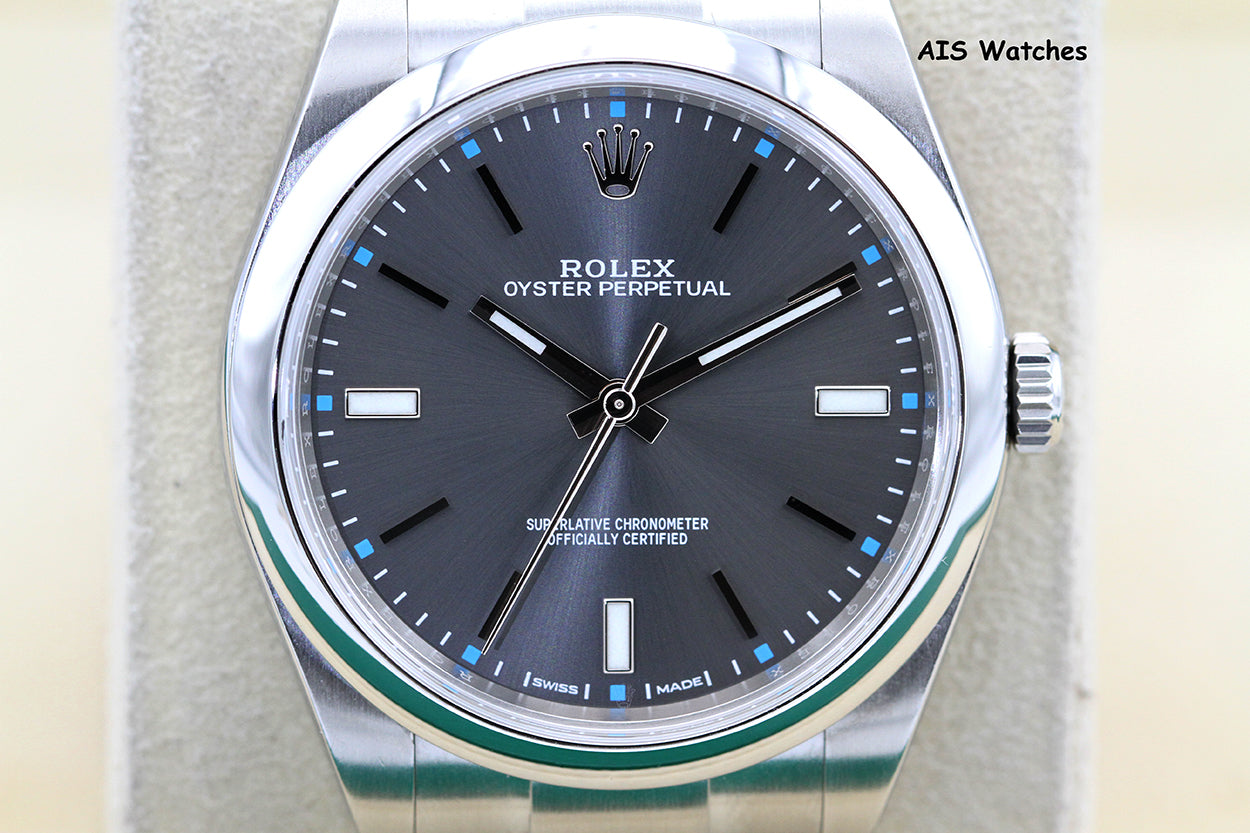 Rolex 114300 Oyster Perpetual 39MM Rhodium Dial 2017 Box & Papers
