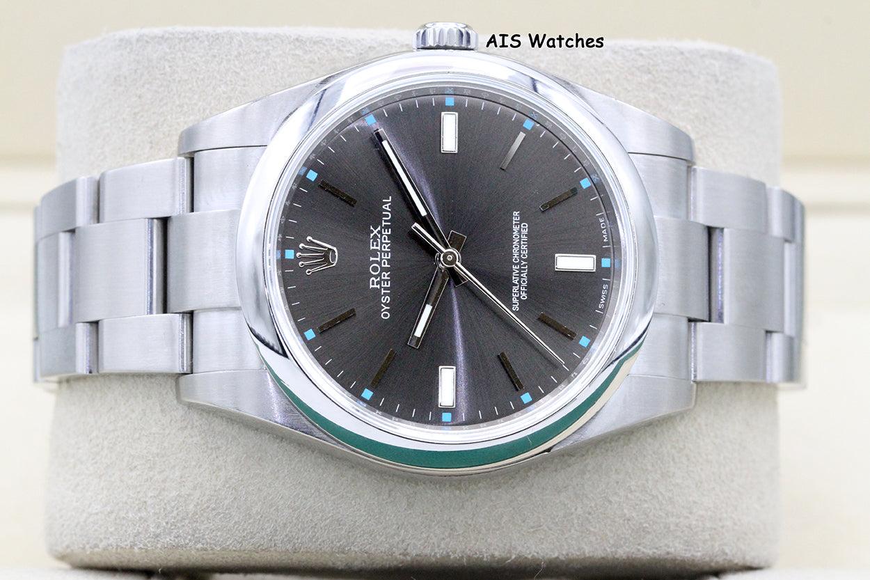 Rolex 114300 Oyster Perpetual 39MM Rhodium Dial 2016 Box & Papers