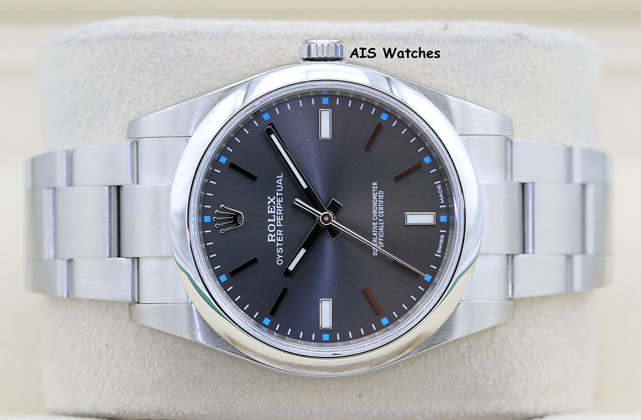 Rolex 114300 Oyster Perpetual 39MM Rhodium Dial 2017 Box & Papers