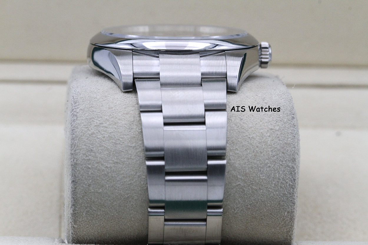 Rolex 114300 Oyster Perpetual 39MM Rhodium Dial 2016 Box & Papers