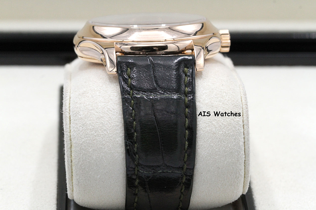 Patek Philippe Annual Calendar 5205R Rose Gold Green Dial Box & Papers