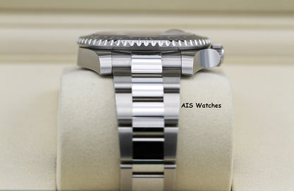 Rolex GMT Master II 126710GRNR Oyster Black / Grey Bezel Bruce Wayne B&P