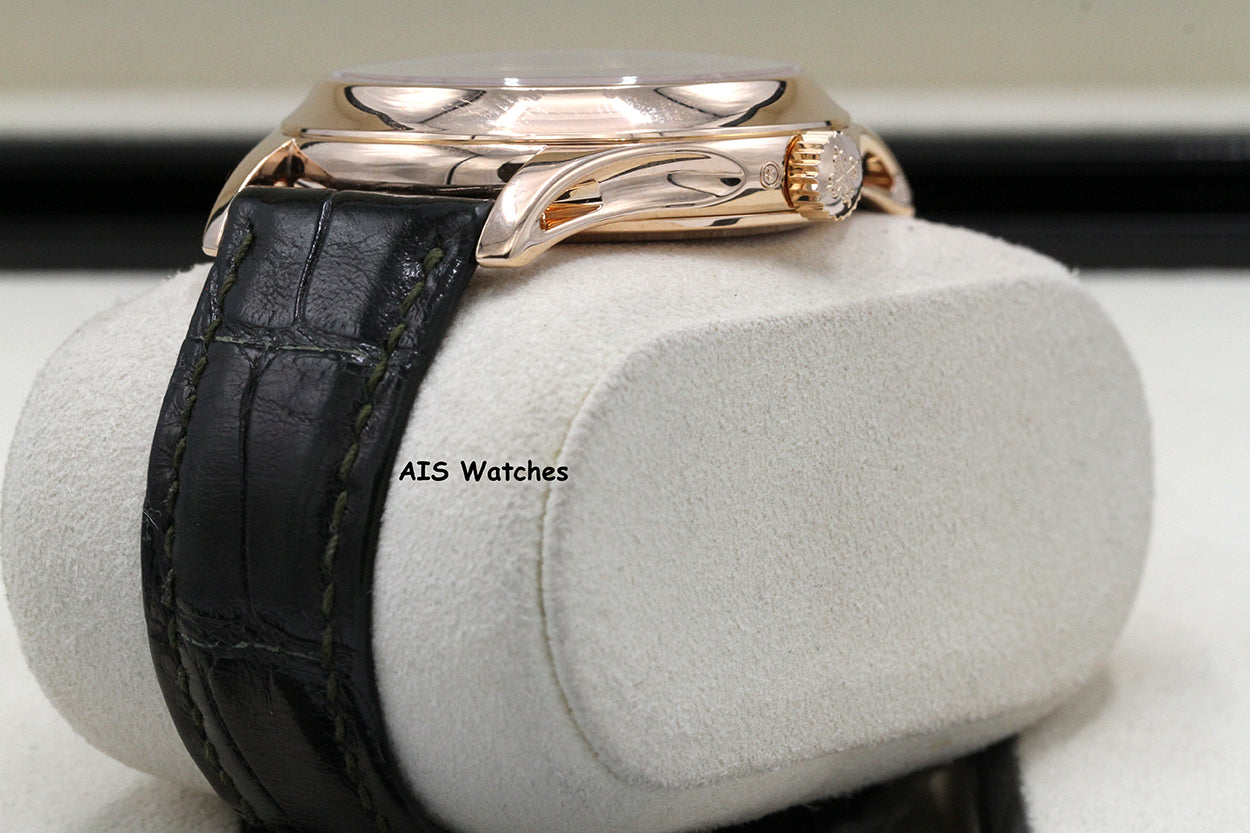Patek Philippe Annual Calendar 5205R Rose Gold Green Dial Box & Papers