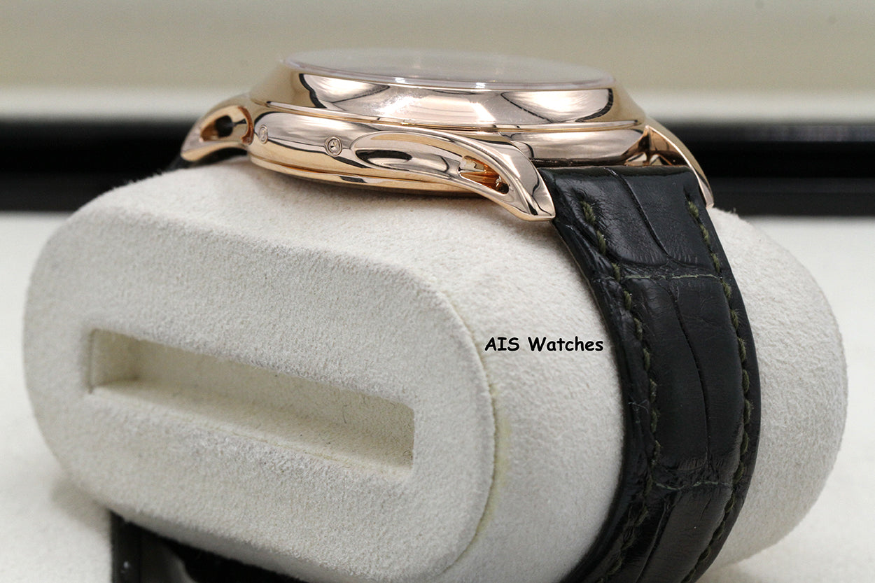 Patek Philippe Annual Calendar 5205R Rose Gold Green Dial Box & Papers