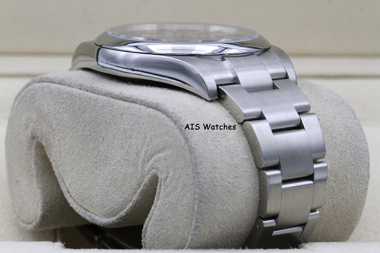 Rolex 114300 Oyster Perpetual 39MM Rhodium Dial 2016 Box & Papers