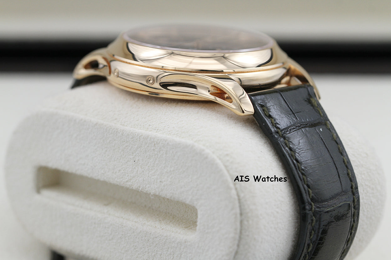 Patek Philippe Annual Calendar 5205R Rose Gold Green Dial Box & Papers