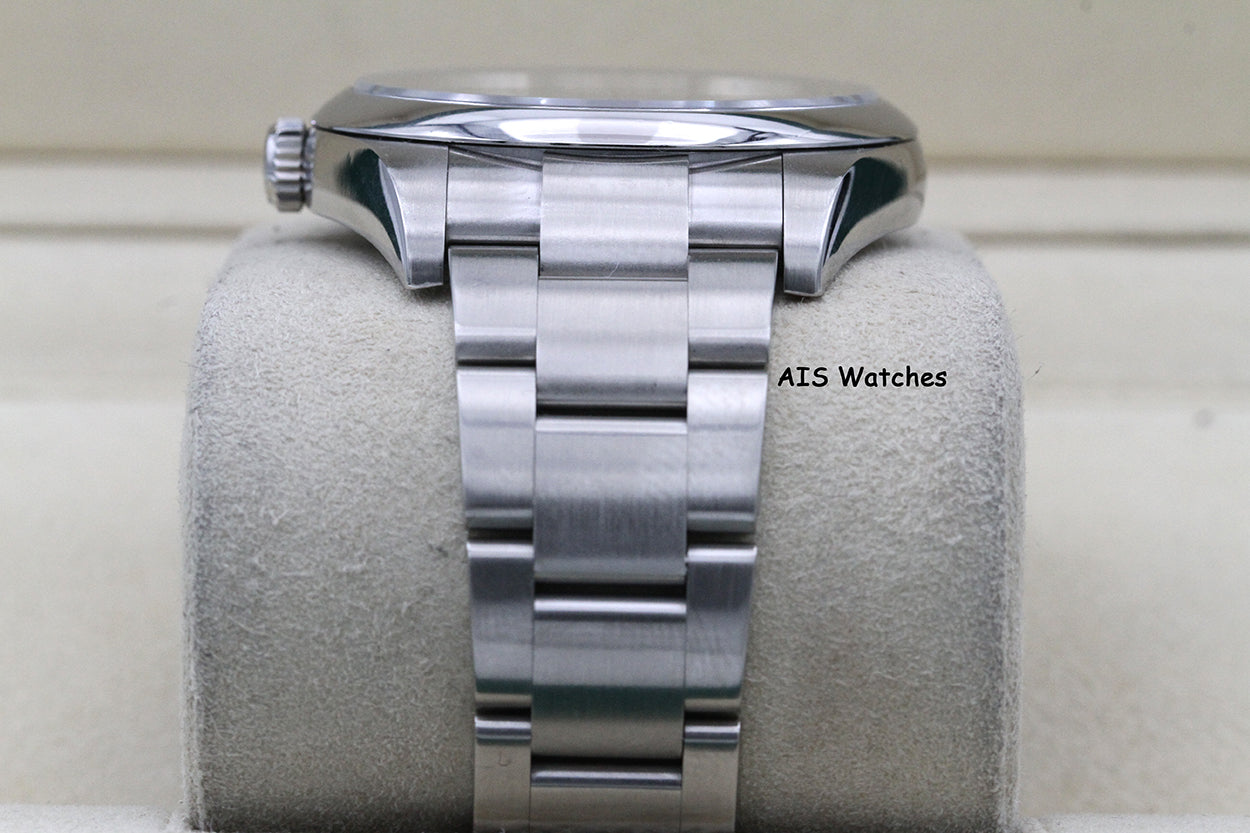Rolex 114300 Oyster Perpetual 39MM Rhodium Dial 2016 Box & Papers
