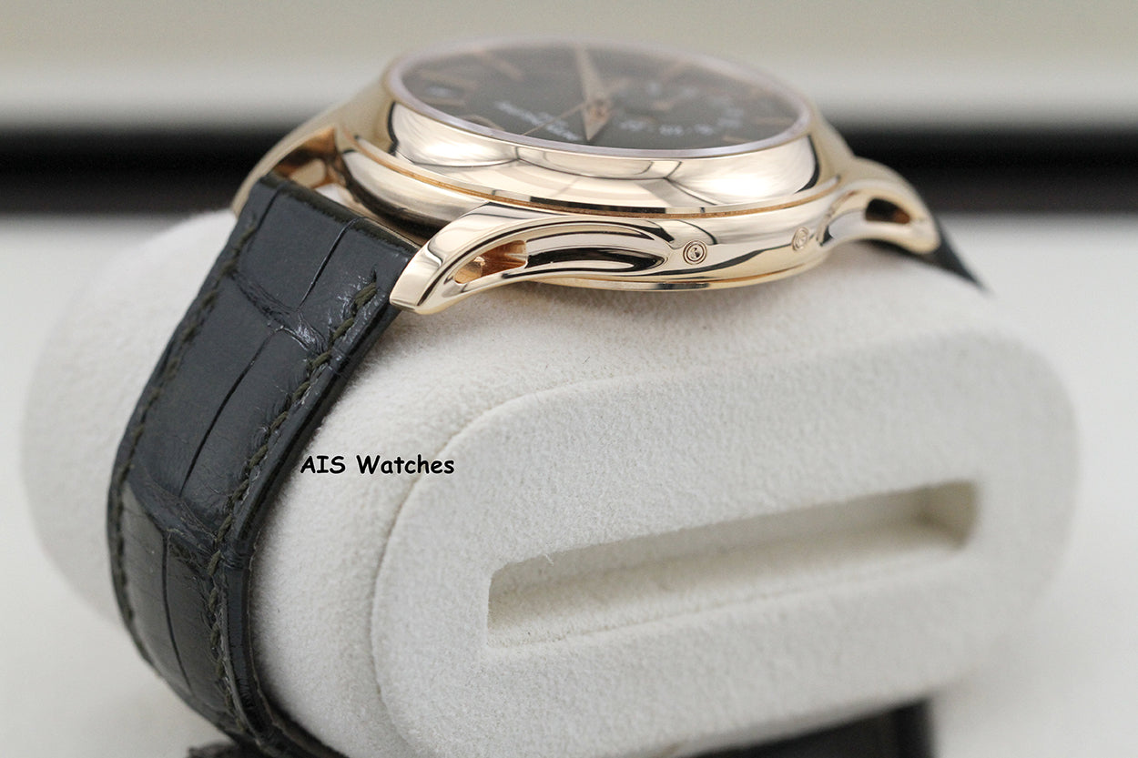 Patek Philippe Annual Calendar 5205R Rose Gold Green Dial Box & Papers