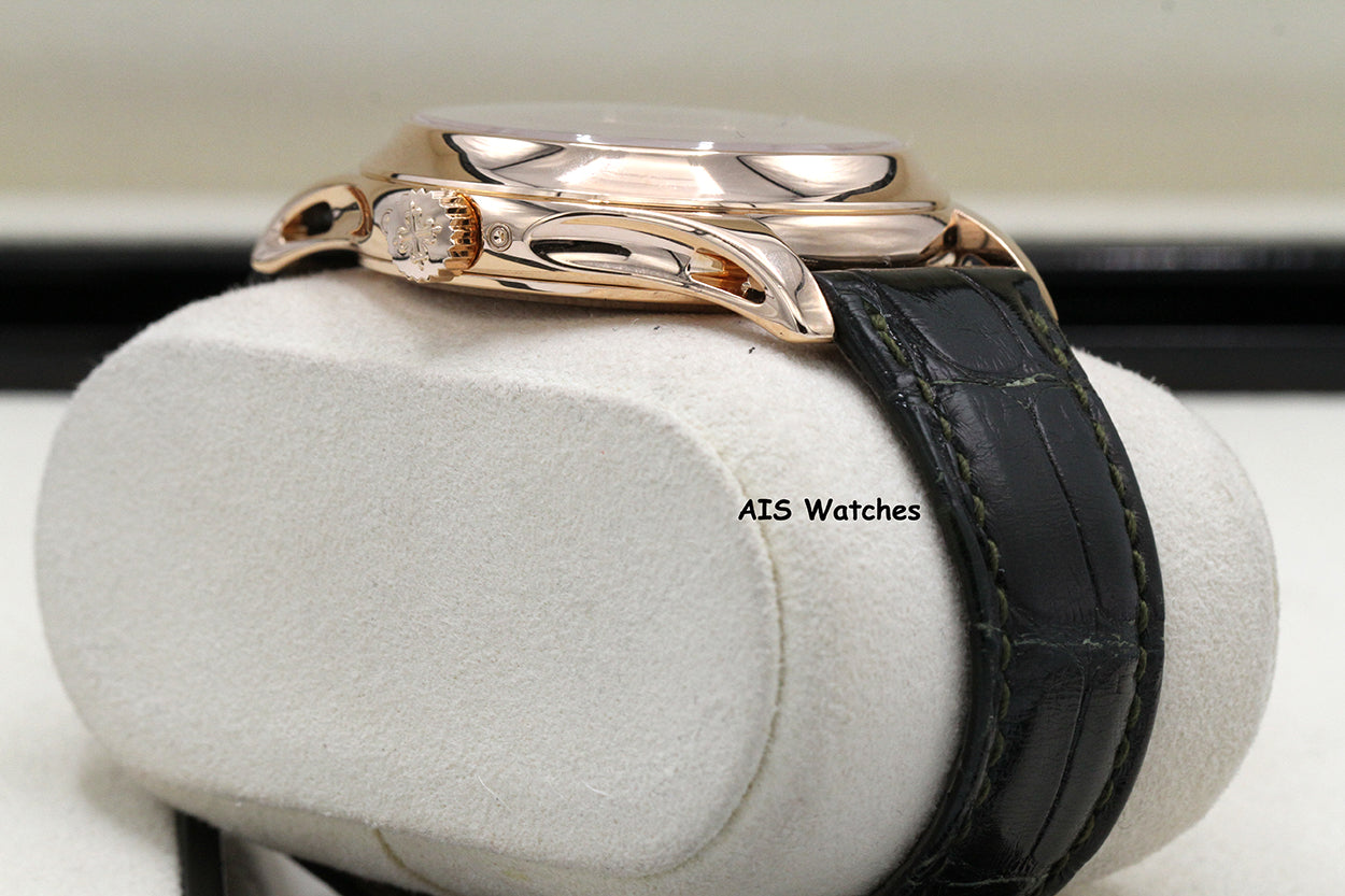 Patek Philippe Annual Calendar 5205R Rose Gold Green Dial Box & Papers